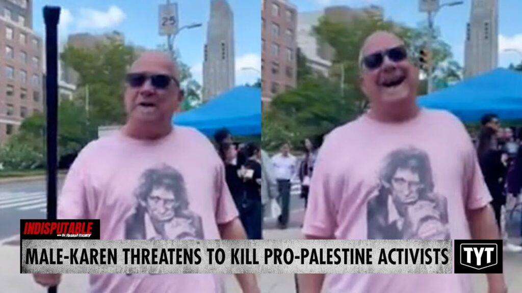 image for watch: male karen threatens to beat activist 'to death' with cane