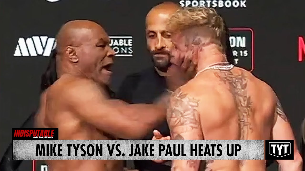 image for watch: mike tyson slaps jake paul in chaotic staredown, tyson speaks out